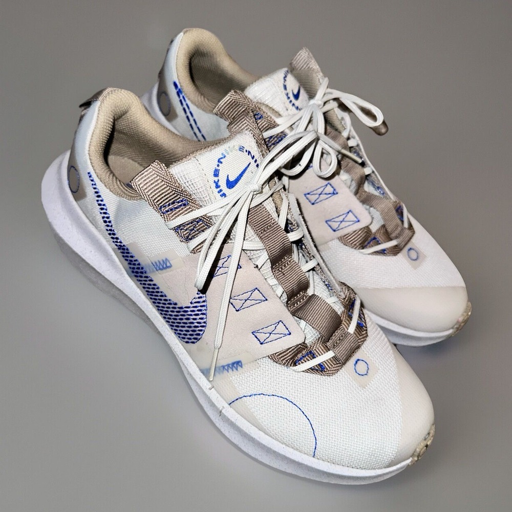 Nike Cream and Brown Athletic Shoes with Blue Accents